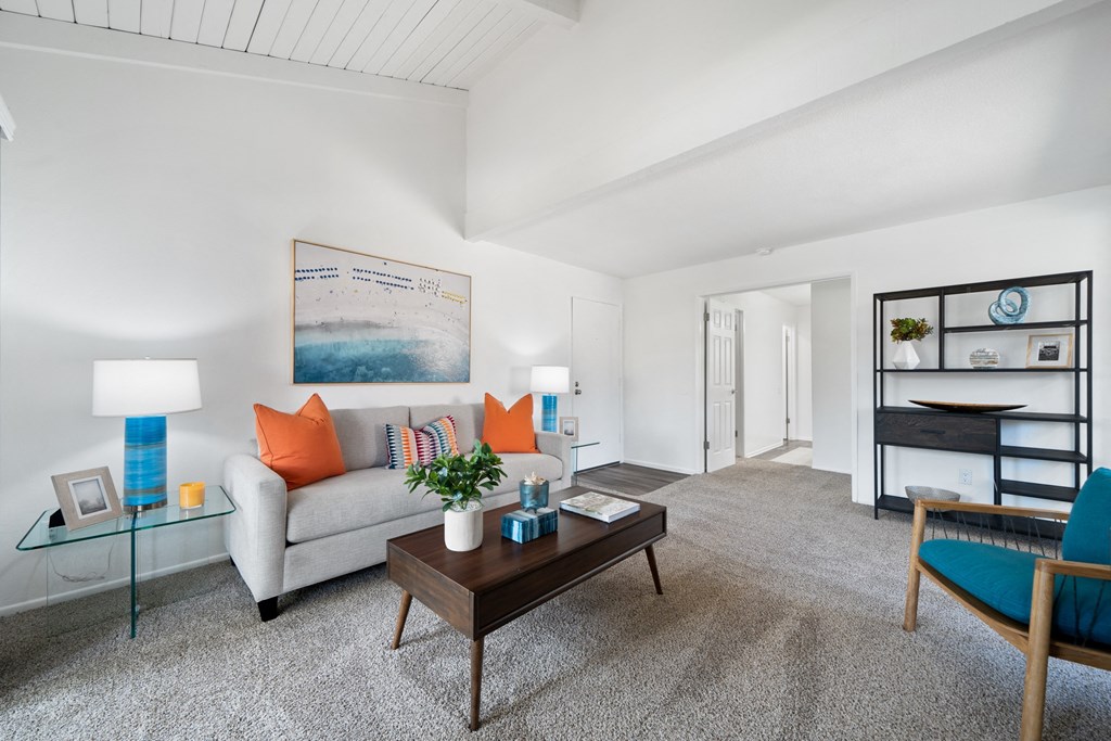 a living room with a couch and a coffee table