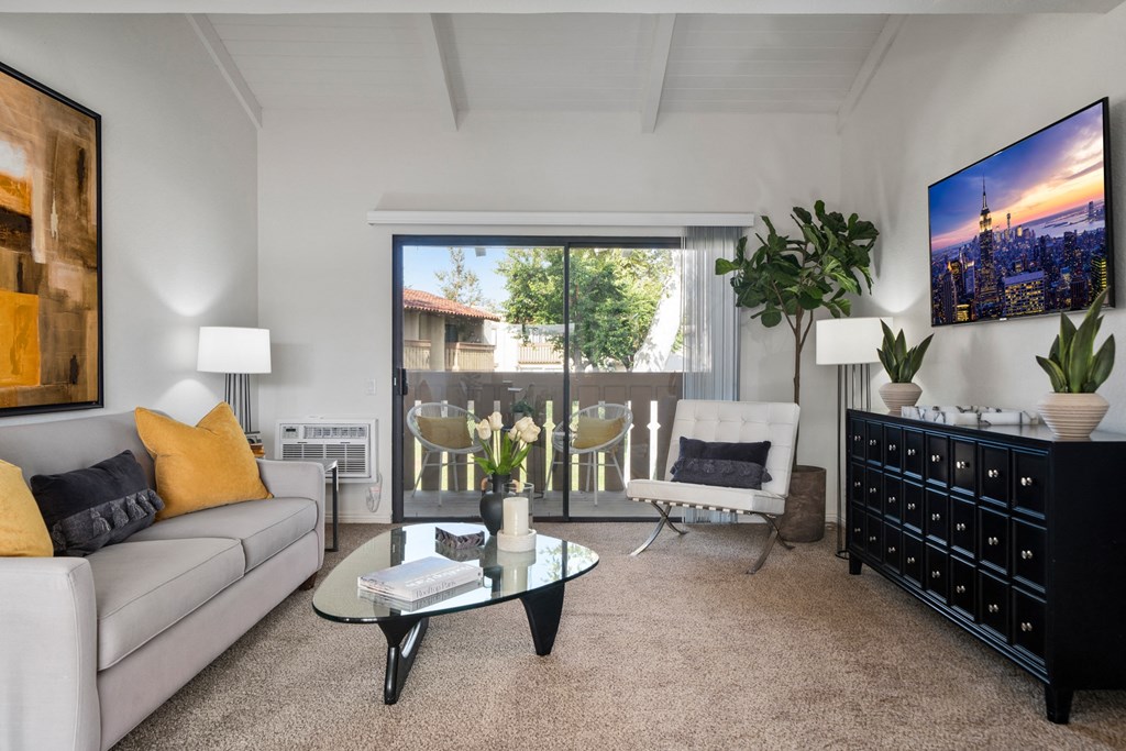 a living room with a couch and a coffee table