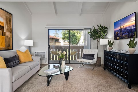 a living room with a couch and a coffee table