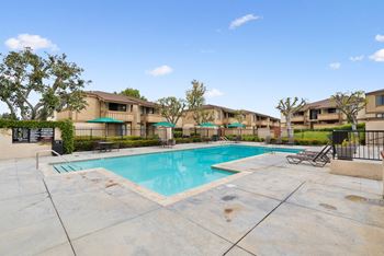 the preserve at ballantyne commons pool and resort style buildings with umbrellas