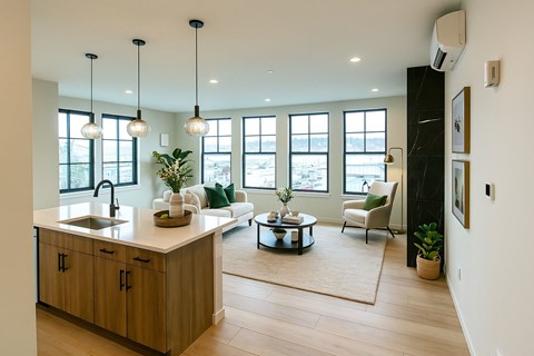 A modern kitchen with wooden cabinets and a large island.