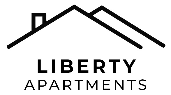 A black and white image of a house with the words "Liberty Apartments" written underneath it.