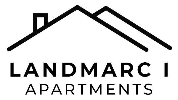 A black and white image of a house with the words "Landmark Apartments" written below it.