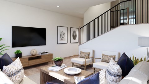 A living room with a sofa set, a coffee table, and a TV on the wall.