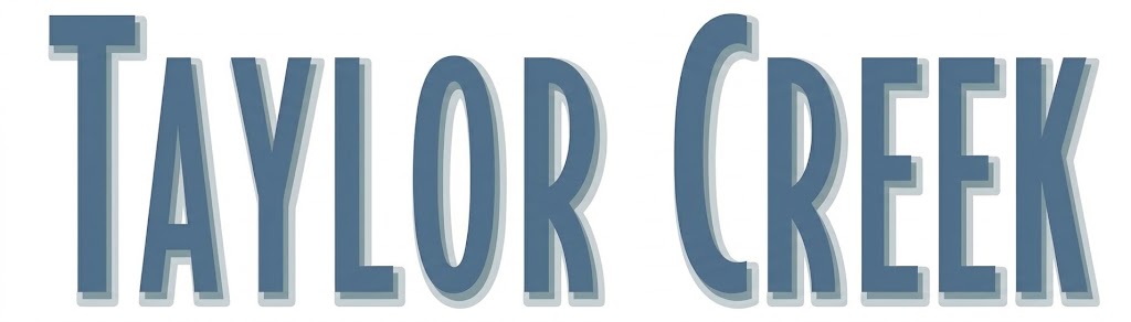 The image shows the text "TAYLOR CREEK" in large blue letters.