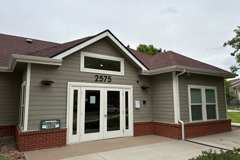 The front of a building with the number 2575 on it.