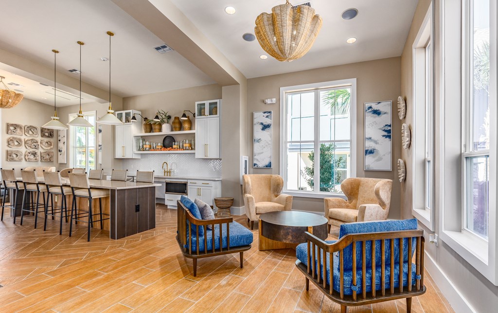 a living room with a kitchen and a dining room