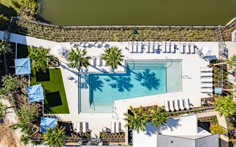 a birds eye view of the pool at the resort at longboat key club