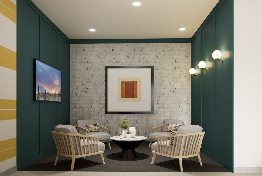 a lounge area with chairs and tables and a television