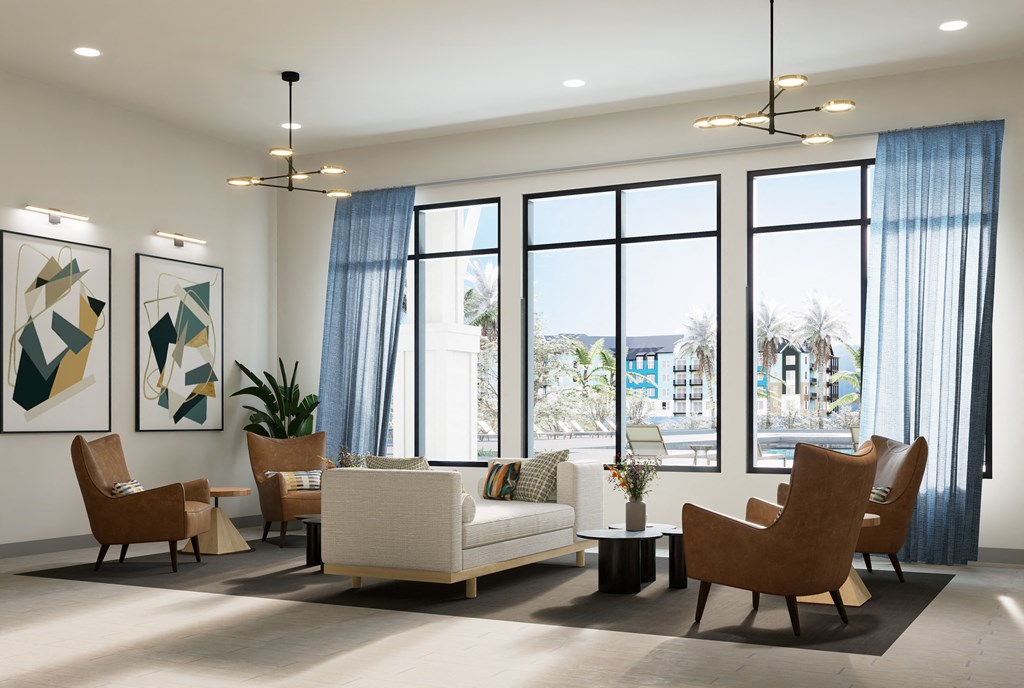 a living room with chairs and couches and large windows