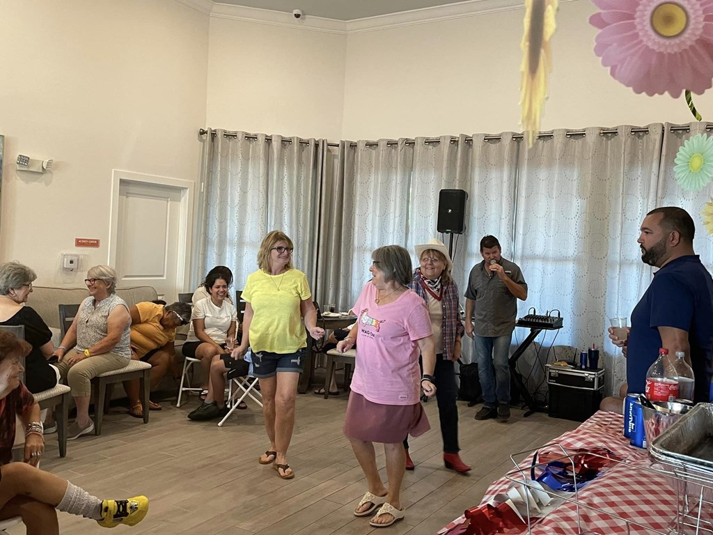 a group of people standing in a room