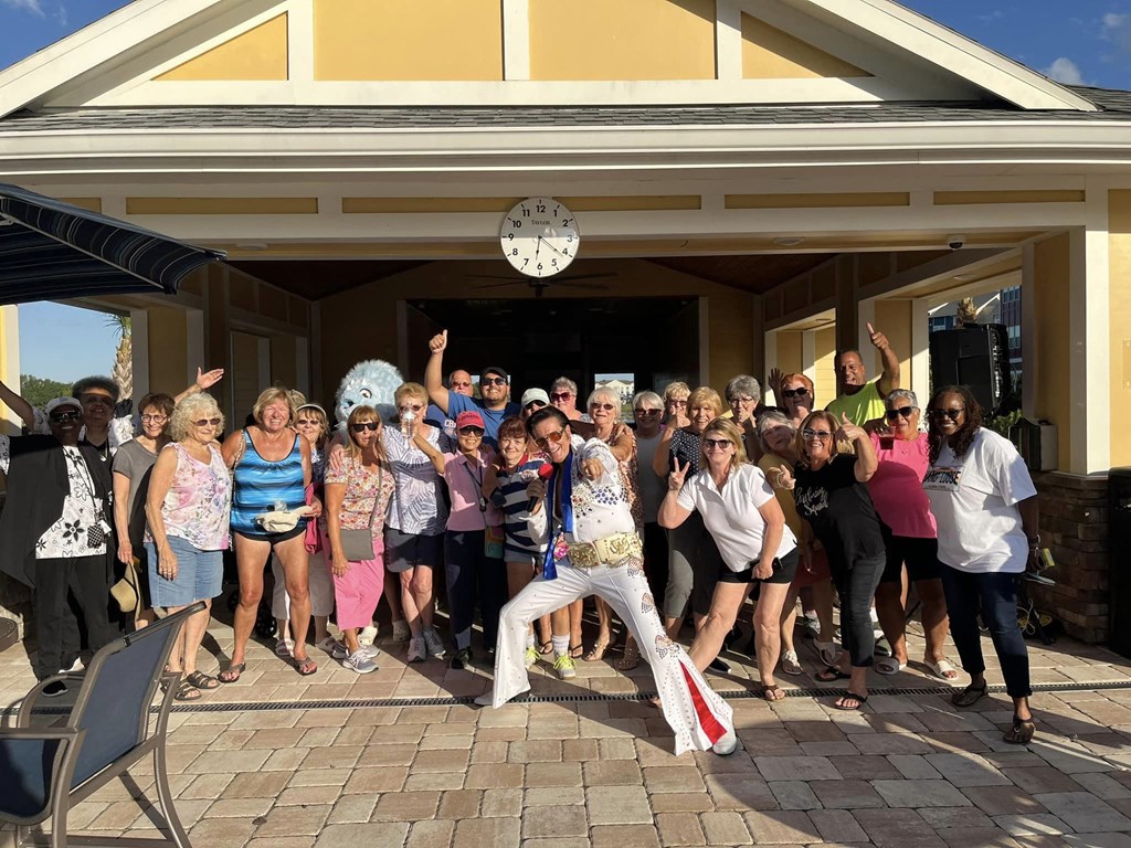 a group of people standing in front of a building