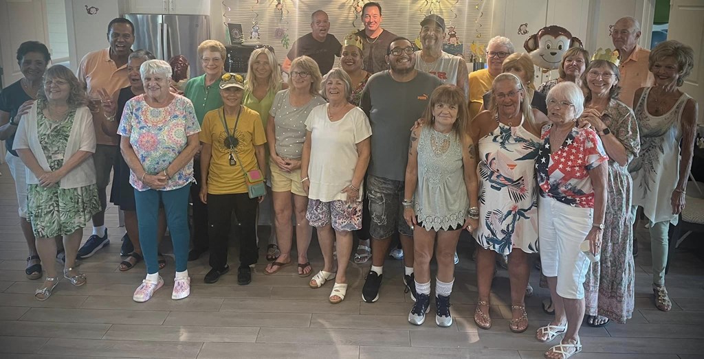 a group of people posing for a photo