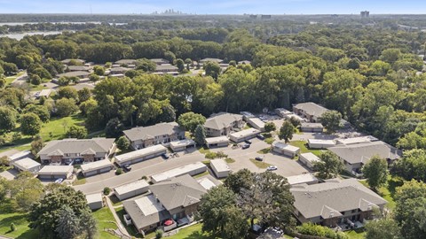 A bird's eye view of a residential area with houses and trees.