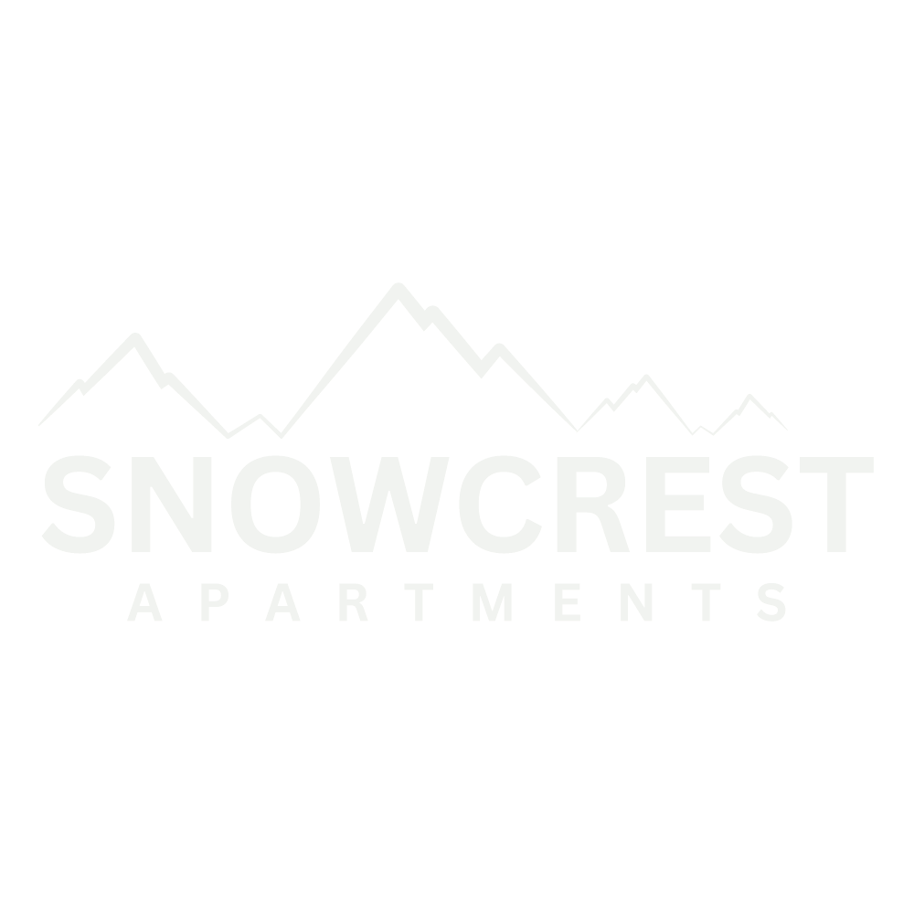 Snowcrest Apartments logo