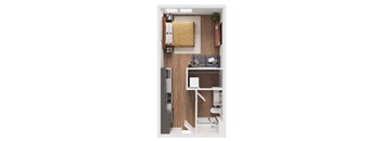 A small room with a bed, desk, and chair.