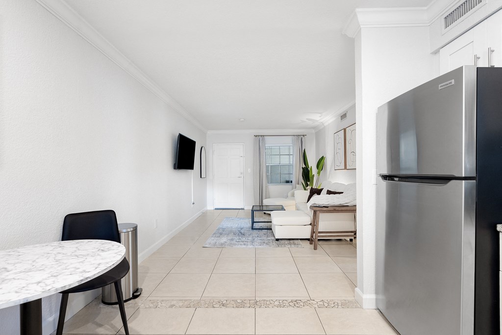 a kitchen and living room in a 555 waverly unit
