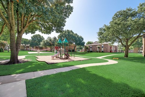 The Park at Wintergreen Apartments | DeSoto, TX  | Playground and Jogging Trail