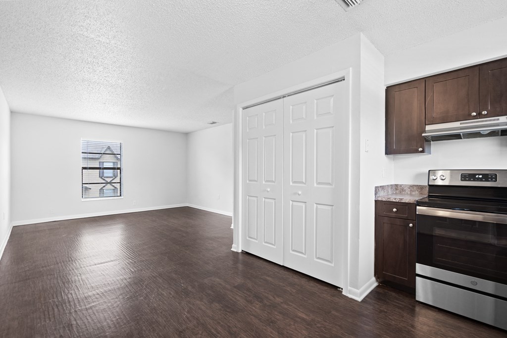 a kitchen and living room in a 555 waverly unit