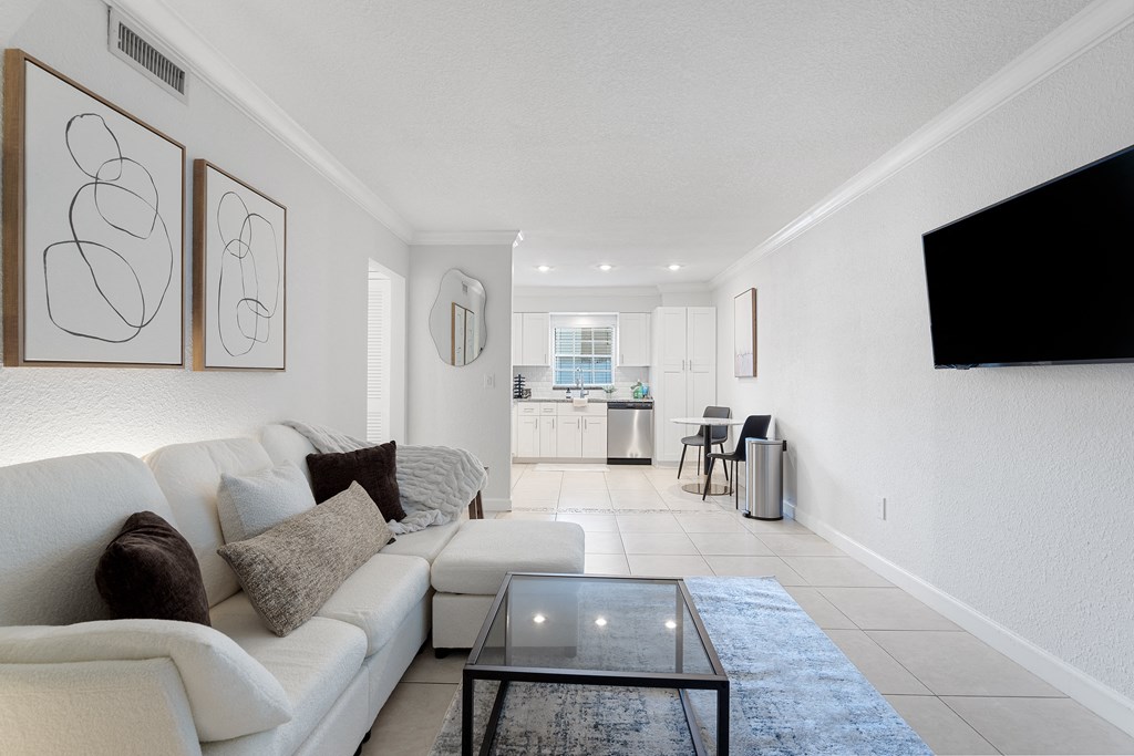 a living room with a couch and a coffee table
