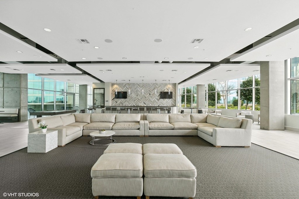 Allure Hermann Park media lounge featuring a large screen HDTV in Houston, TX