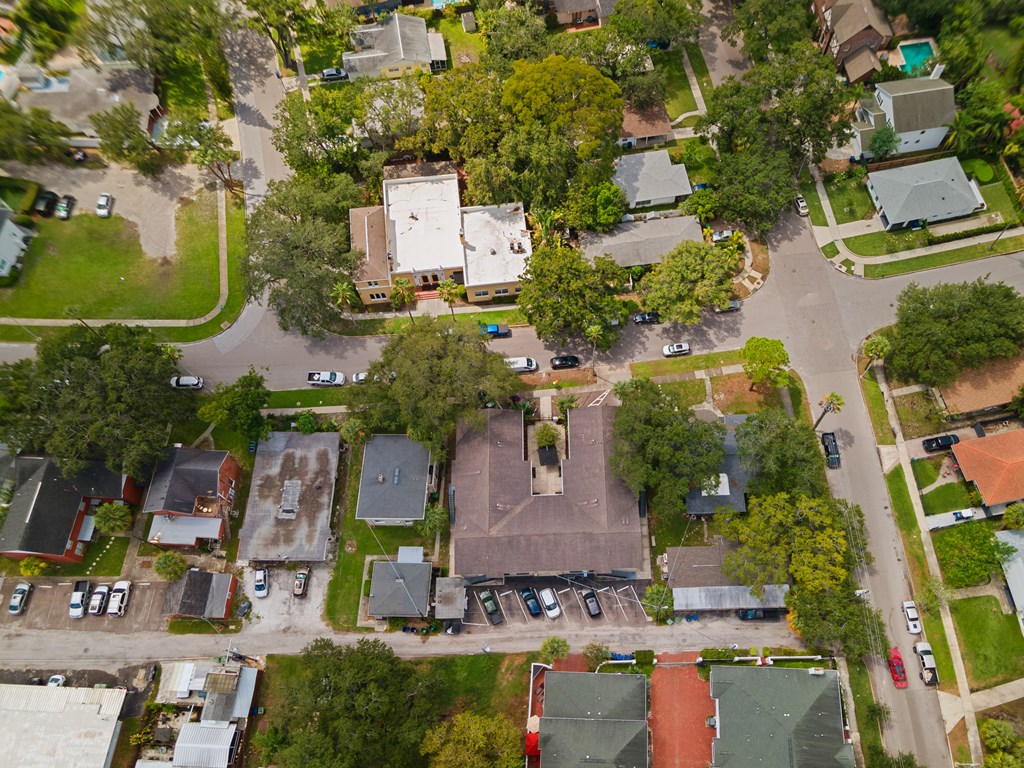 arial view of a neighborhood with houses and trees
