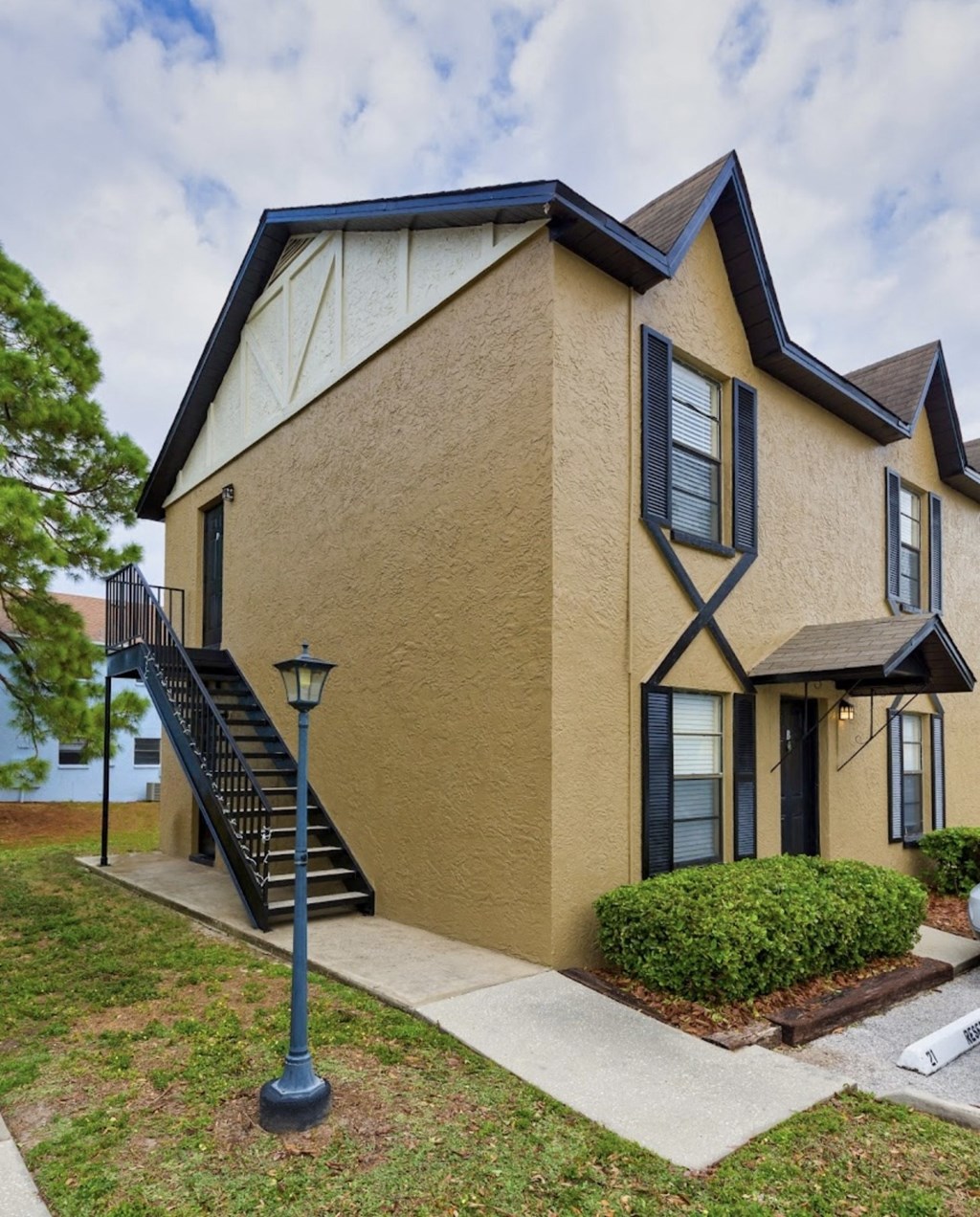 a house with a lamp post in front of it