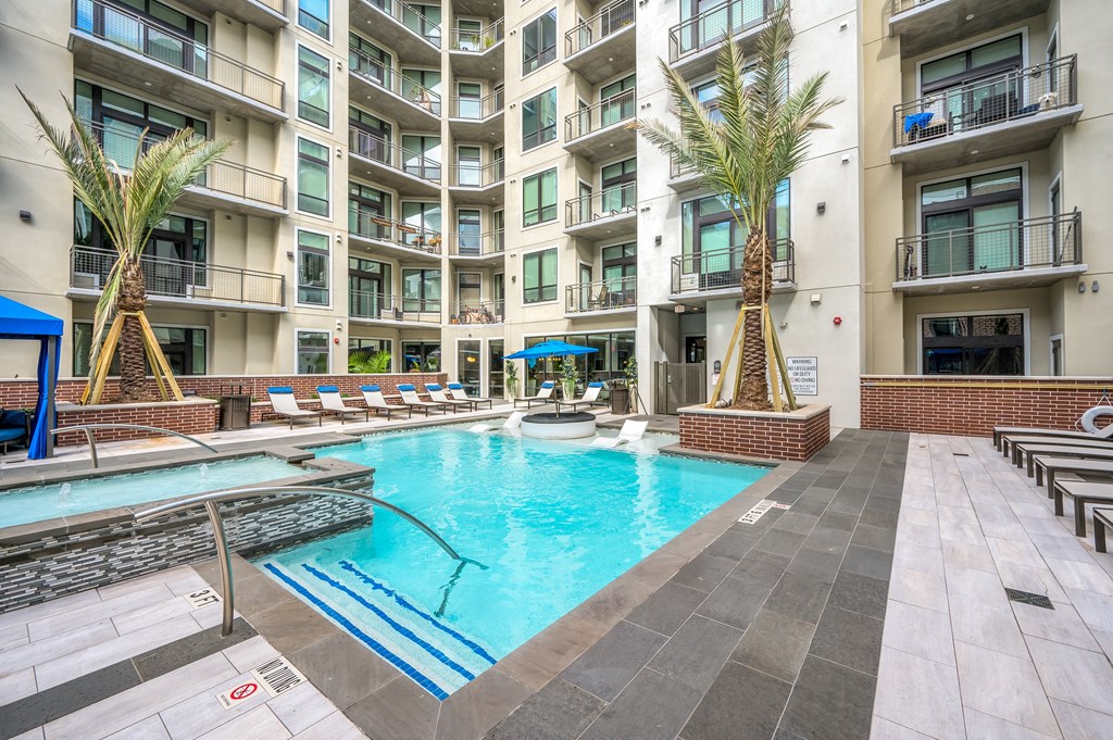 Swimming Pool with Sun shelf and Lounge Areas