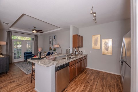a kitchen with a sink and a counter top