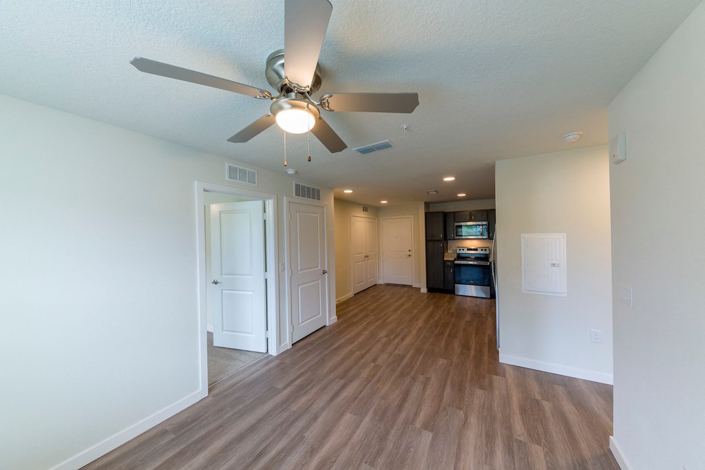 Molly Crossing| Middleburg, FL | Living Room with Wood Style Flooring