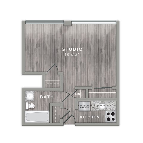 A floor plan of a studio apartment with a bath, kitchen, and studio space.
