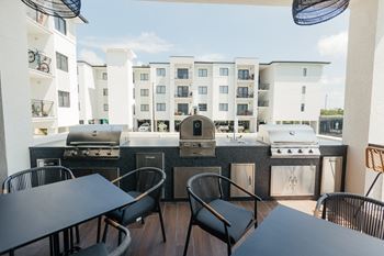 Wrecker's Cay | Key West | Resort Style Terrace Overlooking Pool with Gourmet Cooking Areas