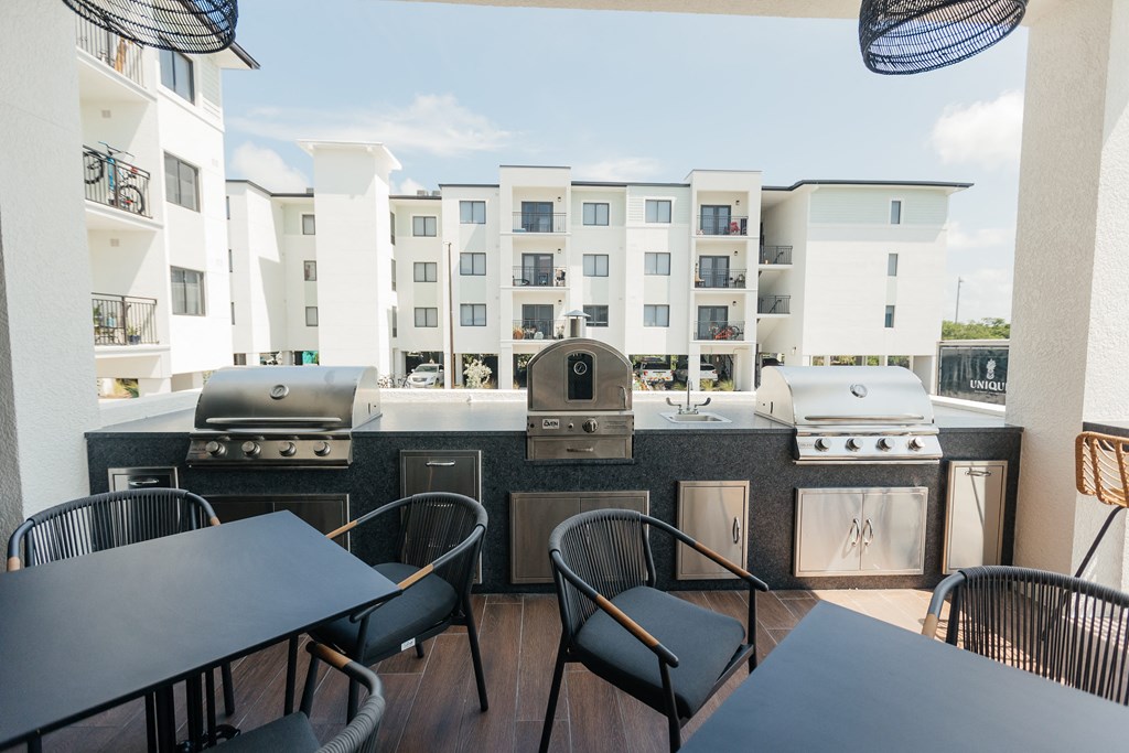 Wrecker's Cay | Key West | Resort Style Terrace Overlooking Pool with Gourmet Cooking Areas