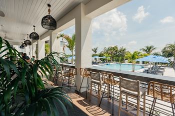 Wrecker's Cay | Key West | Resort Style Terrace Overlooking Pool with Gourmet Cooking Areas