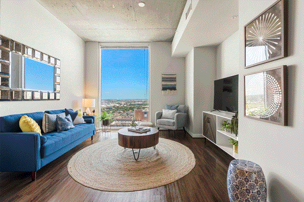 Bright, open living area with contemporary décor and natural light at Med Center in Houston, TX.