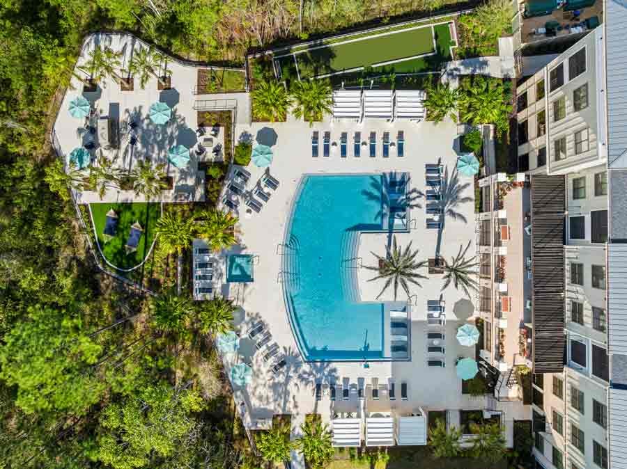 Scenic swimming pool at Longboat Key Club Resort, Longboat Key, FL, overlooking tranquil waters