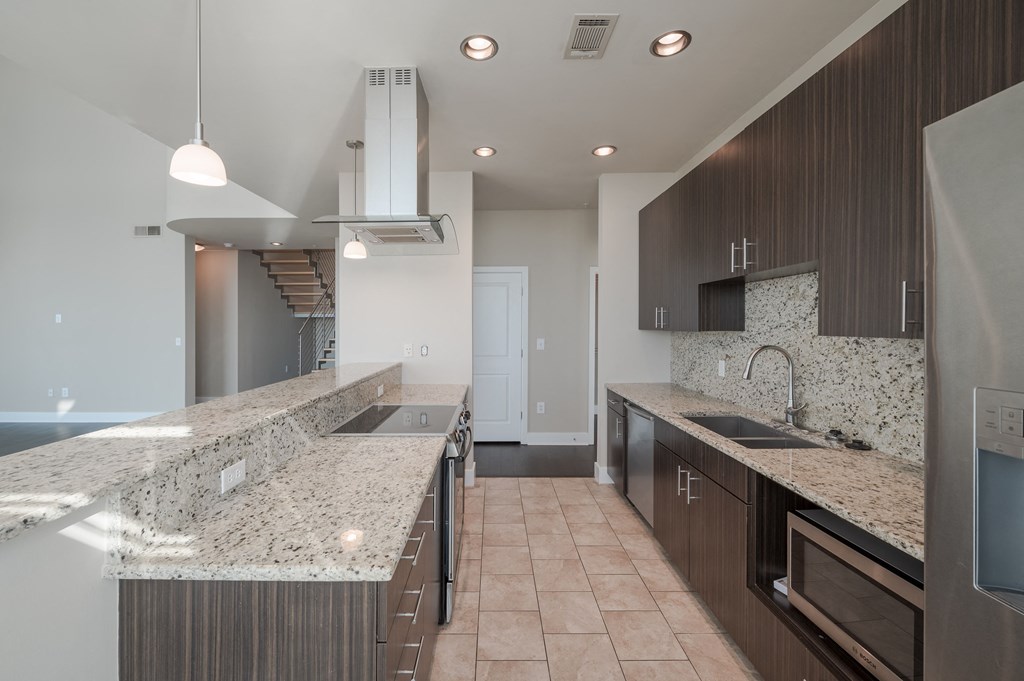 Allure Hermann Park | Penthouse Apartment Kitchen