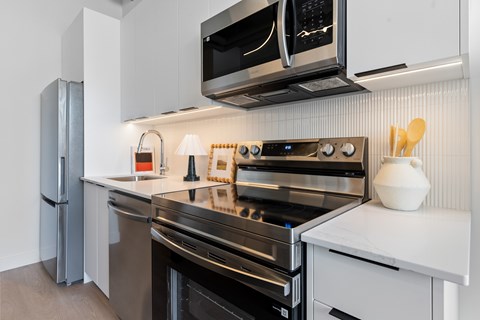 Kitchen with Stove top oven at Richmond Square, London