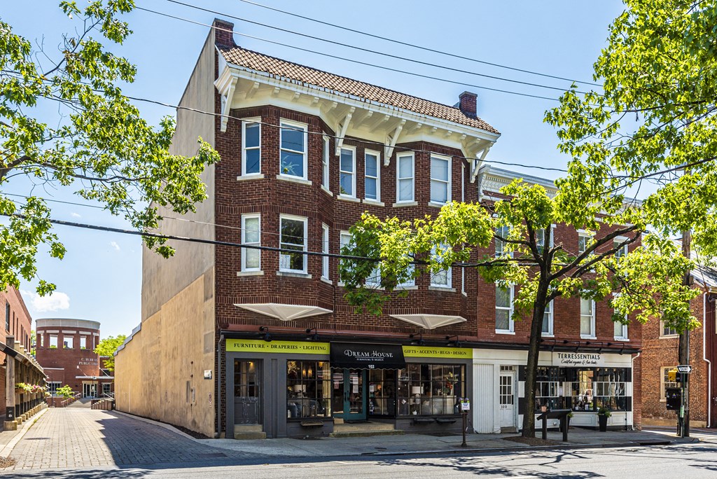 a brick building on the corner of a street