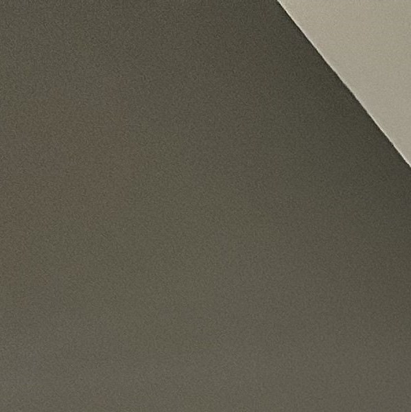 A row of brown chairs are lined up against a wall.