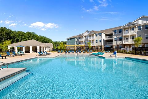 the swimming pool at the preserve at polo ridge apartments in dripping springs
