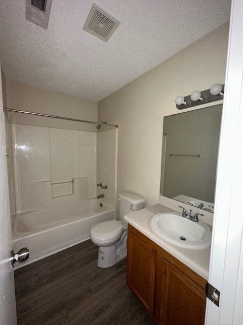 a bathroom with a sink toilet and a tub
