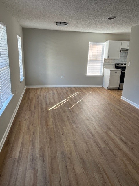 Unfurnished Living Area at Granville Oaks Apartment Homes, Creedmoor, NC 27522