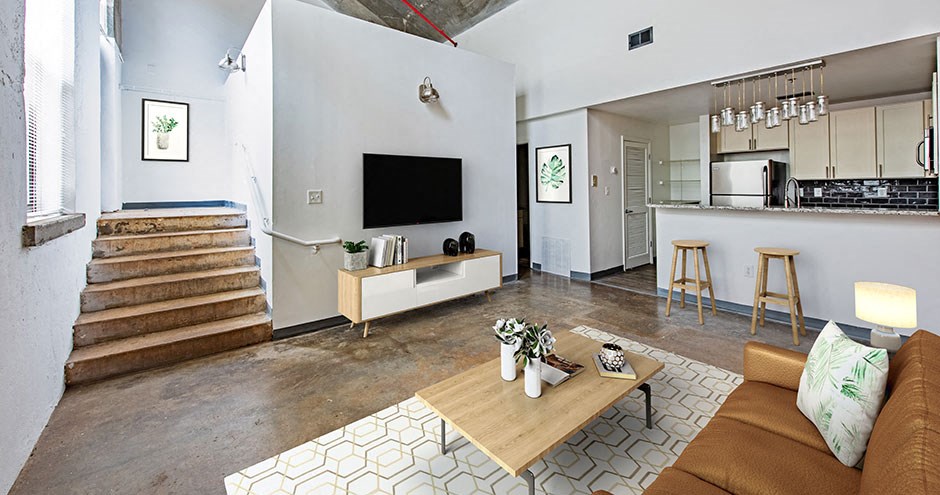 a living room with a couch and a television