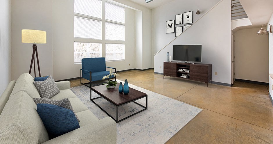 a living room with a couch and a television