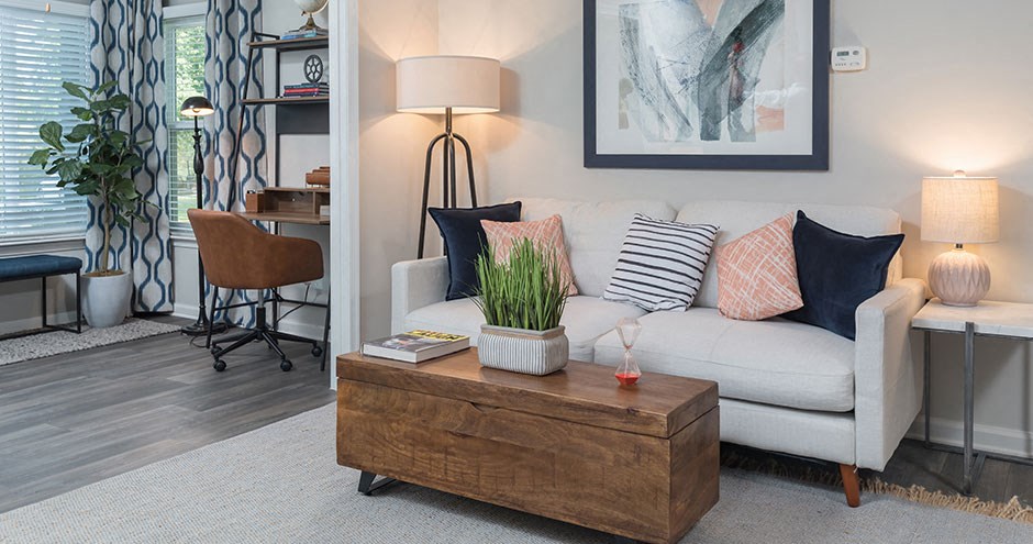 a living room with a couch and a coffee table