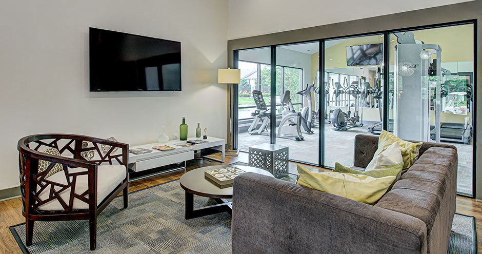 a living room with a couch and a television