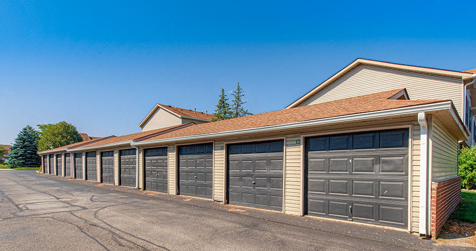 a row of garages with closed doors