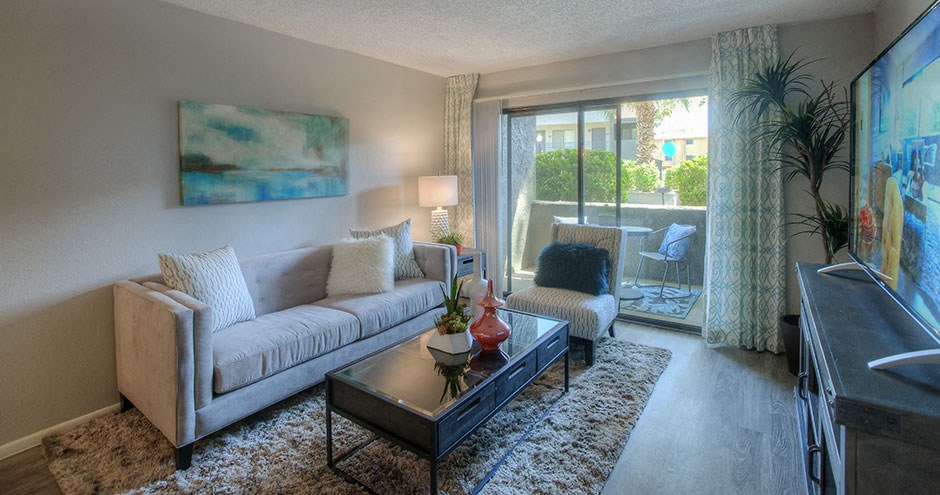 a living room with a couch and a table