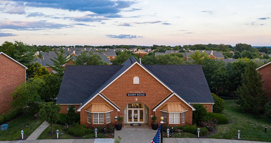 an aerial view of a house in a neighborhood